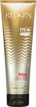 Gouden tube met FPF 40, 'REDKEN frizz dismiss rebel tame' en 'brazilian super oil'. 8.5 fl oz 250 ml.
