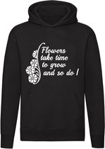 Flowers give you time to grow  Hoodie | bloemen | groeien | gedicht | vertrouwen | liefde | sweater | trui  | unisex | Zwart