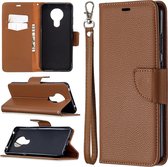 Voor Nokia 5.3 Litchi Textuur Pure Kleur Horizontale Flip Leren Case met Houder & Kaartsleuven & Portemonnee & Lanyard (Bruin)
