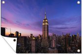 Muurdecoratie Mooi beeld van het Empire State Building in de avond - 180x120 cm - Tuinposter - Tuindoek - Buitenposter