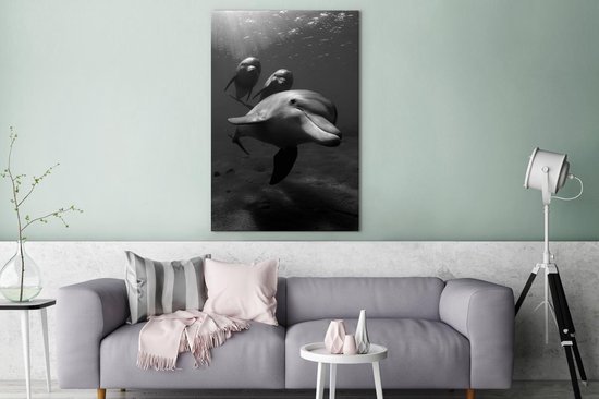 Tableau sur toile Photo sous-marine de trois dauphins - noir et blanc - 80x120 cm - Décoration murale