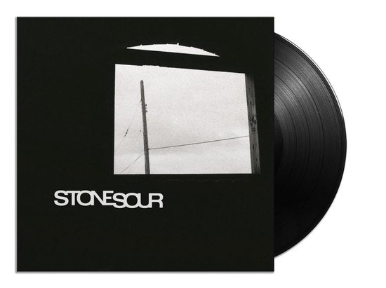 Disque vinyle noir avec pochette. La pochette présente une photo noir et blanc d'une fenêtre avec un poteau et des fils. Le texte 'STONESOUR' est en bas.