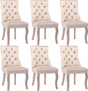 Set van zes beige fluwelen eetkamerstoelen met knopquilting en houten poten.