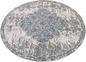 Tapis rond gris avec un motif floral bleu et gris détaillé, d'aspect vintage, au centre et une texture usée.
