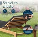 Details van de ligstoel: verstelbare bevestigings- en klittenbanden voor stabiliteit.