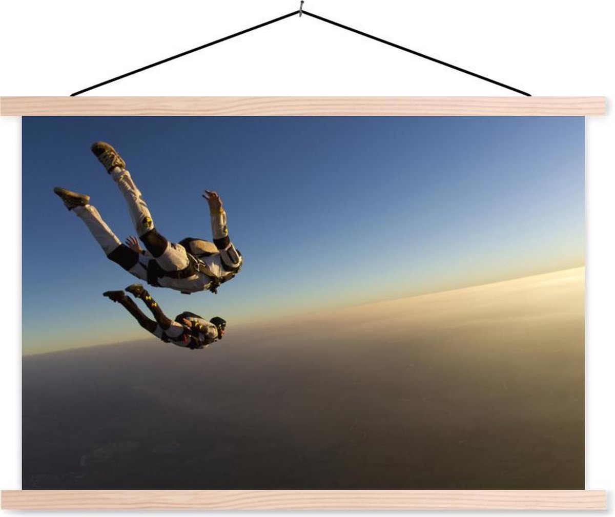 Skydiven tijdens de ondergaande zon textielposter latten blank 150x100 cm - Foto print op schoolplaat (wanddecoratie woonkamer/slaapkamer) - TextilePosters