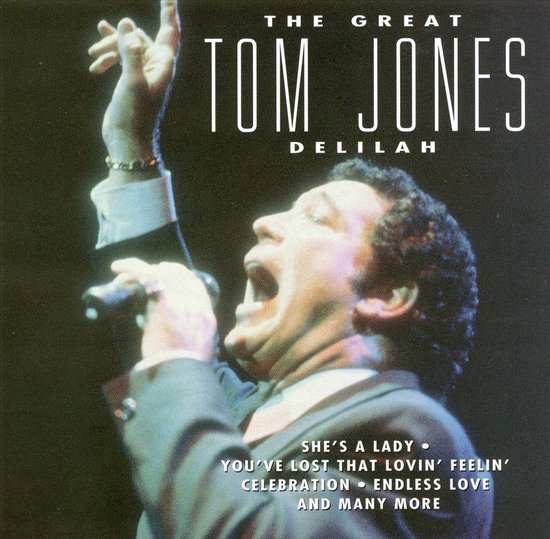 Tom Jones zingt met open mond en opgeheven arm, met de tekst 'THE GREAT TOM JONES DELILAH' en een lijst met nummers.