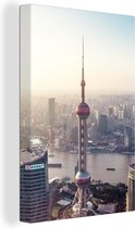 Canvas Schilderij Luchtfoto van de Oriental Pearl Tower in Shanghai - 20x30 cm - Wanddecoratie