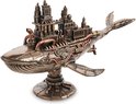 Steampunk walvis met fabrieksopbouw, bronzen afwerking.