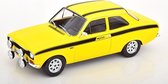 Het 1:18 gegoten model van de Ford Escort MKI Mexico uit 1973 in geel. De fabrikant van het schaalmodel is MCG. Dit model is alleen online verkrijgbaar