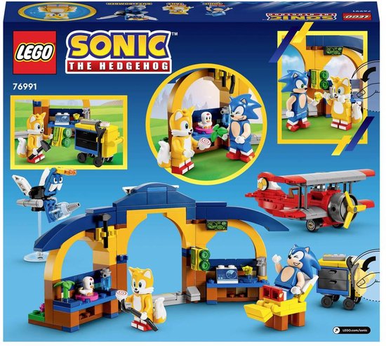 LEGO Sonic the Hedgehog doos met Tails' werkplaats, Tornado-vliegtuig, Sonic, Tails en een Buzz Bomber-figuur.
