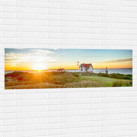 WallClassics - Muursticker - Zonsondergang bij Boederijen - 150x50 cm Foto op Muursticker