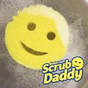 Gele Scrub Daddy spons met gezicht en logo in schuim.