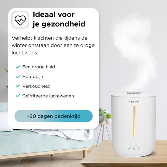 Wit Qumax luchtbevochtiger op een houten tafel, geeft stoom af. Tekst zegt "Ideaal voor je gezondheid".
