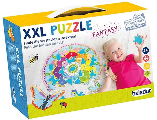 Puzzle XXL Fantasy avec un enfant de 4+ tenant une pièce. Le puzzle montre un mandala rond avec des insectes cachés, des papillons et des fleurs.