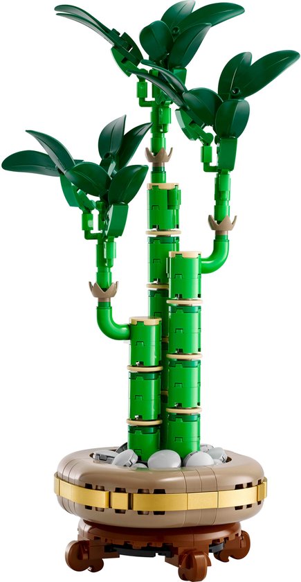 Plante de bambou LEGO verte dans un pot doré avec des pierres.