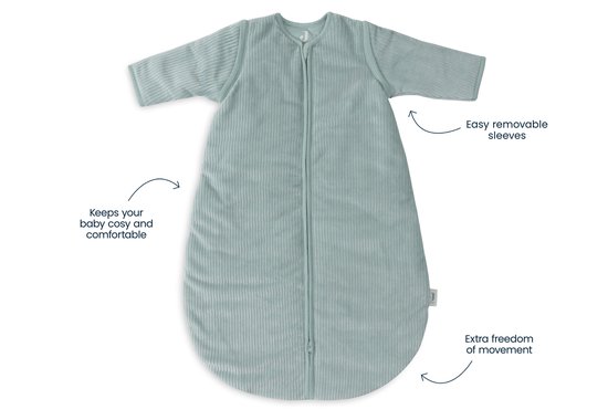 Lichtgroene baby slaapzak met ribbelstructuur, rits en afneembare mouwen. Houdt je baby warm en comfortabel.