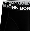 Detail van een zwarte Björn Borg boxer met witte merknaam op de band.