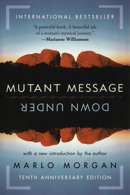 Boekomslag 'Mutant Message Down Under' met rode rotsformaties en een reflectie. "A powerful book. A beautiful tale of a woman's mystical journey." - Marianne Williamson.