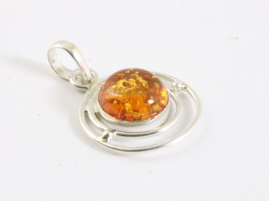 Pendentif rond en argent ajouré et ambre