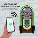 Jukebox met "VERBINDUNG ÜBER BLUETOOTH" tekst, bediend via smartphone.