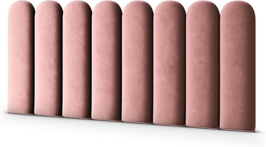 Een rij van acht zachtroze, gestoffeerde wandpanelen met ronde bovenkant.