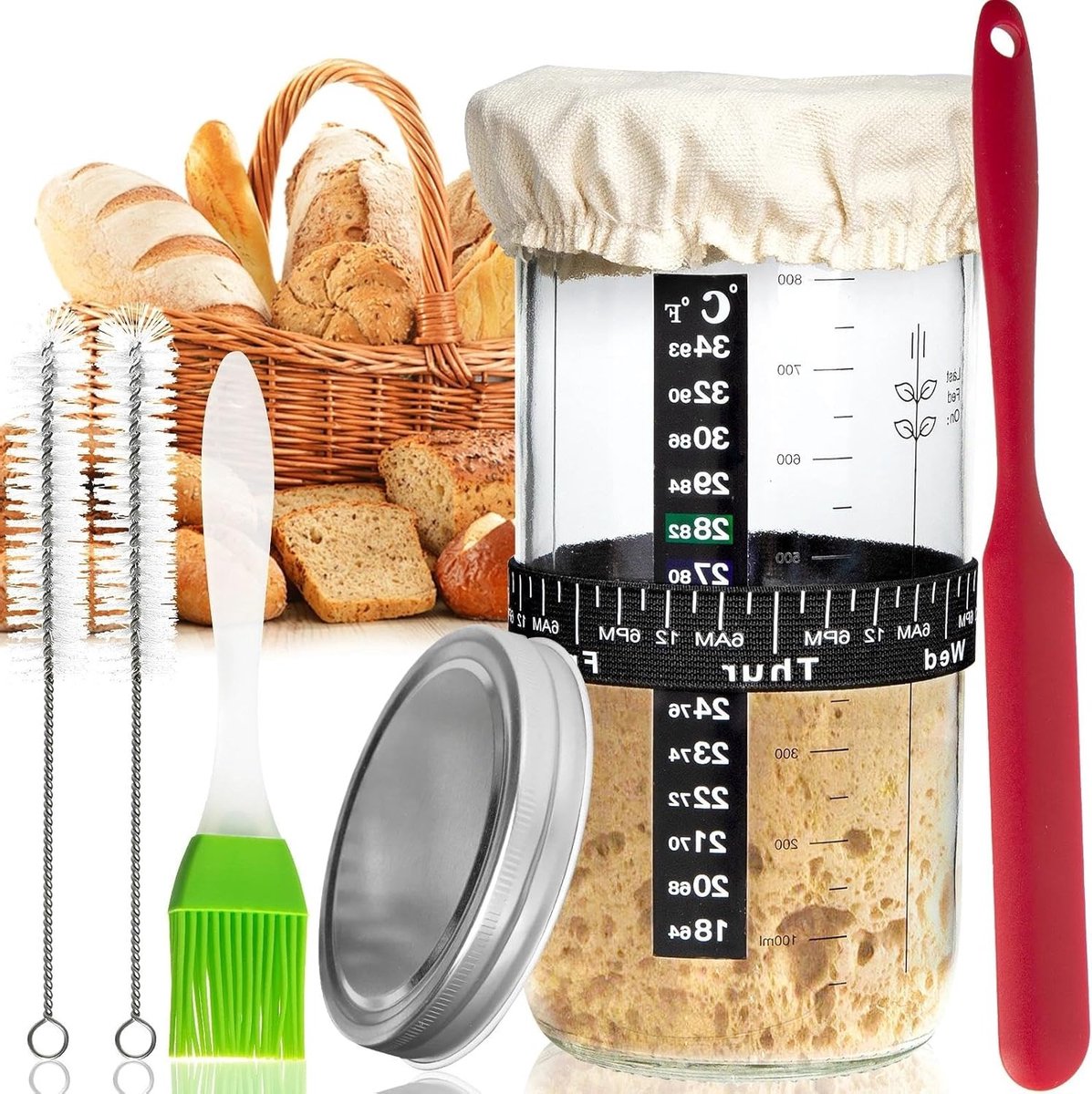 Grote glazen pot voor zuurdesemstarter met datumring, thermometer, doek en metalen deksel voor thuisbakken van zuurdesembrood