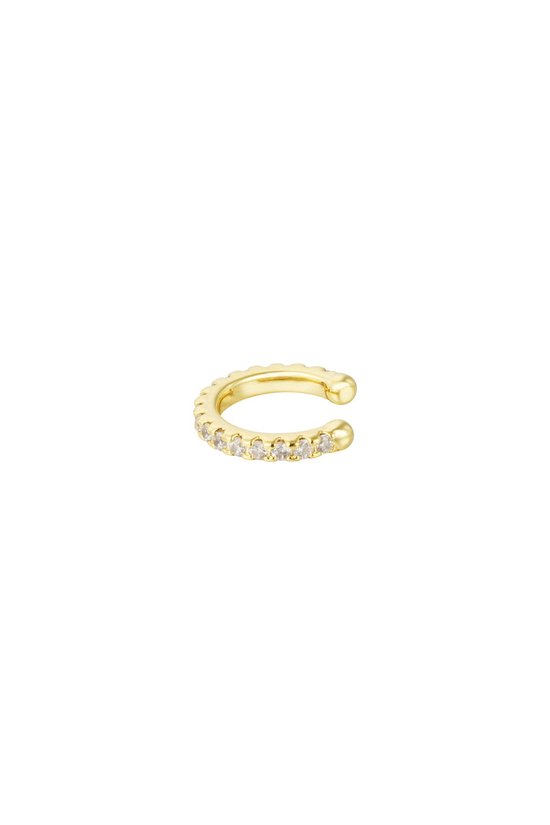 Gouden earcuff met witte steentjes.