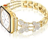 Gouden horlogebandje met vlinders en strass, aan een gouden Apple Watch bevestigd.