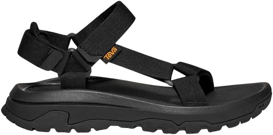 Zwarte Teva sandaal met dikke zool, verstelbare banden en een grof profiel op de zool.