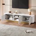 Witte dressoirkast met gouden voet, open deuren met opbergruimte.