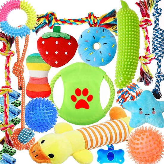 Een kleurrijke verzameling honden speeltjes, waaronder een donut, aardbei, eend, ster, bot en diverse touwen.