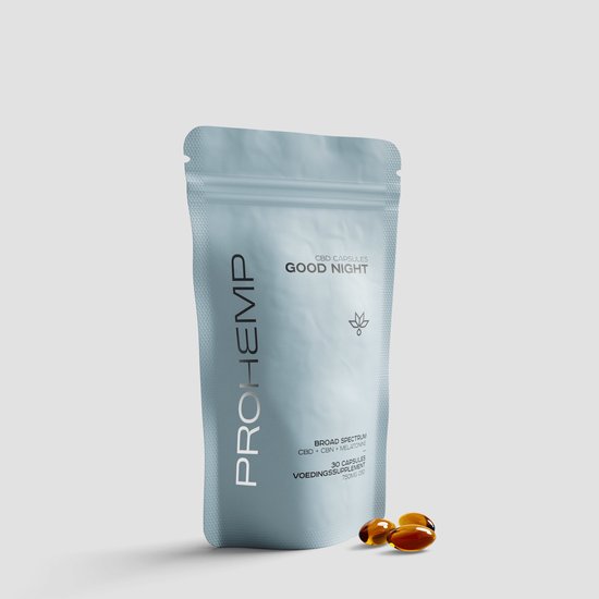 Lichtblauwe ProHemp Good Night verpakking met 'CBD CAPSULES GOOD NIGHT' erop. Twee amberkleurige capsules liggen ernaast.