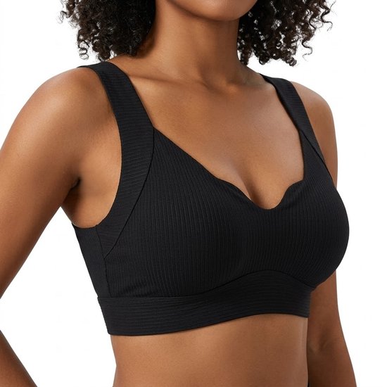 Zwarte naadloze sport bh met V-hals en ribstructuur, met brede bandjes.