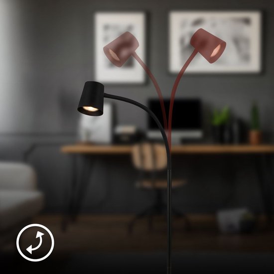Zwarte staande lamp met verstelbare lampkop.