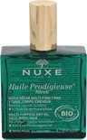 Groene Nuxe Huile Prodigieuse Néroli fles met gouden dop. De tekst op de fles is weerspiegeld.