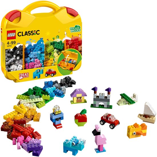Gele LEGO Classic koffer met daarbuiten diverse gebouwde LEGO modellen.