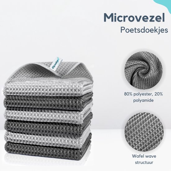 Pile de torchons en microfibre gris clair et gris foncé à motif gaufré. 80 % polyester, 20 % polyamide.