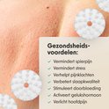 Close-up van huid met rode vlekken, omringd door witte acupressuurpunten. Geeft gezondheidsvoordelen aan.