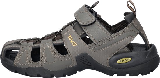 Grijsbruine Teva sandalen met klittenbandsluiting, gele veters en "Teva" logo.
