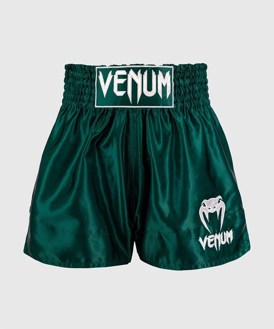 Donkergroene Venum kickbokshort met elastische tailleband en wit logo.