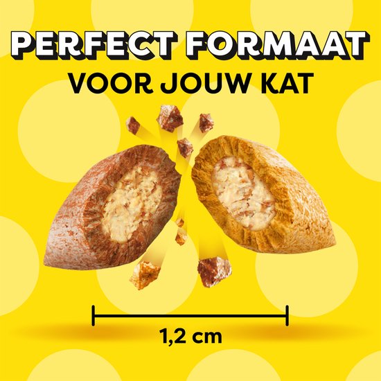 Twee doorsneden van Catisfactions snacks met kruimels en een schaalverdeling van 1,2 cm.