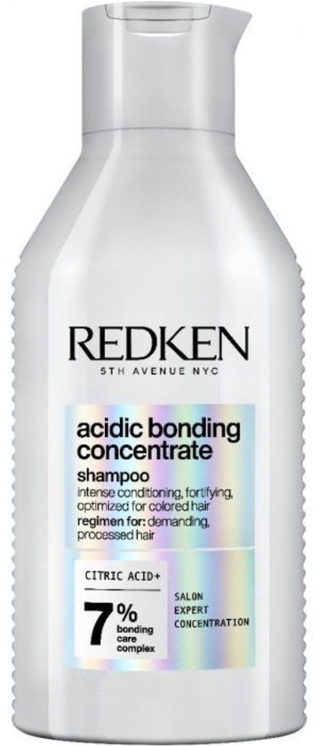 Bouteille de shampooing Redken Acidic Bonding Concentrate de 300 ml avec un corps blanc et des accents argentés et violets.