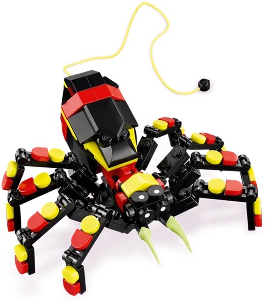 LEGO spin in zwart, rood en geel, met acht poten, twee tandjes en een geel koordje.