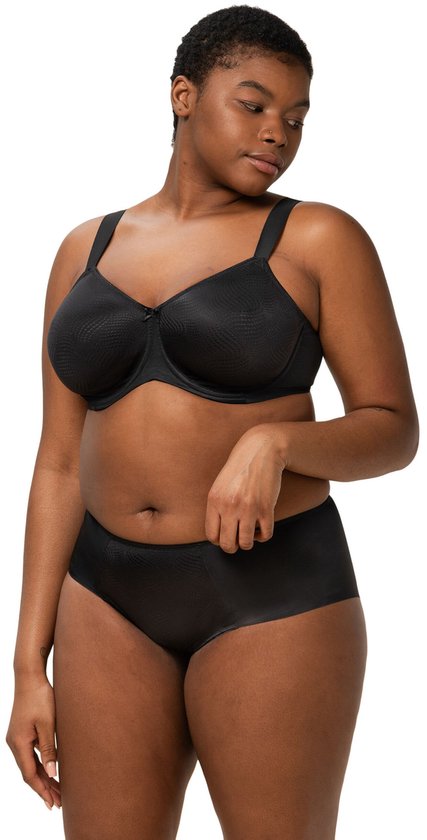 Zwarte minimizer beha met brede bandjes, gedragen door een vrouw met korte krullend haar.