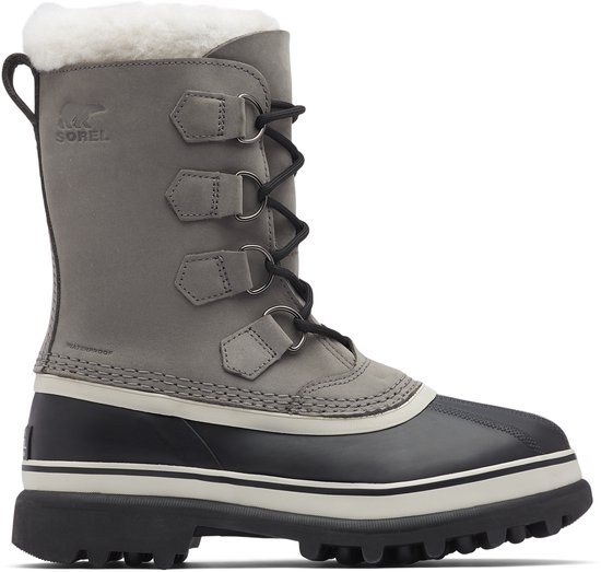 Grijze Sorel winterlaarzen met witte bontrand, zwarte zool en veters.