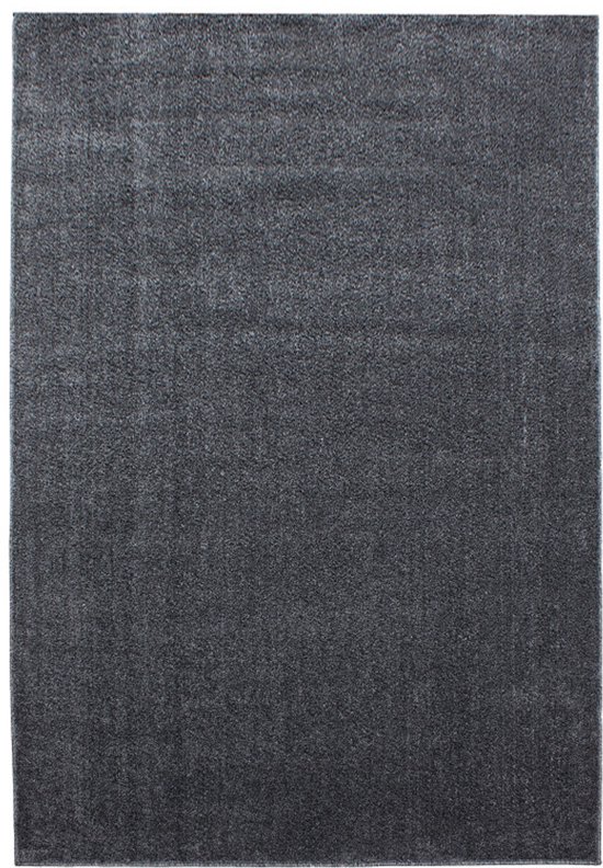 Un tapis uni gris foncé, à plat sur un fond blanc.