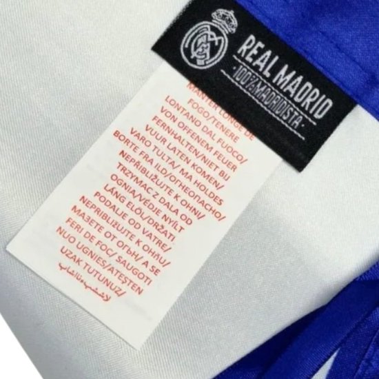 Waslabel van Real Madrid met tekst 'REAL MADRID - 100% MADRIDISTA'.