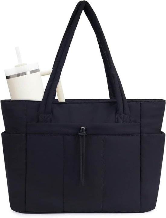 Sac fourre-tout noir avec poignées renforcées et poches extérieures, tenant une tasse.