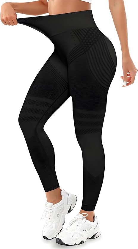 Legging de sport noir sans couture pour femmes, avec des coutures décoratives détaillées sur les jambes. Le tissu est étiré.